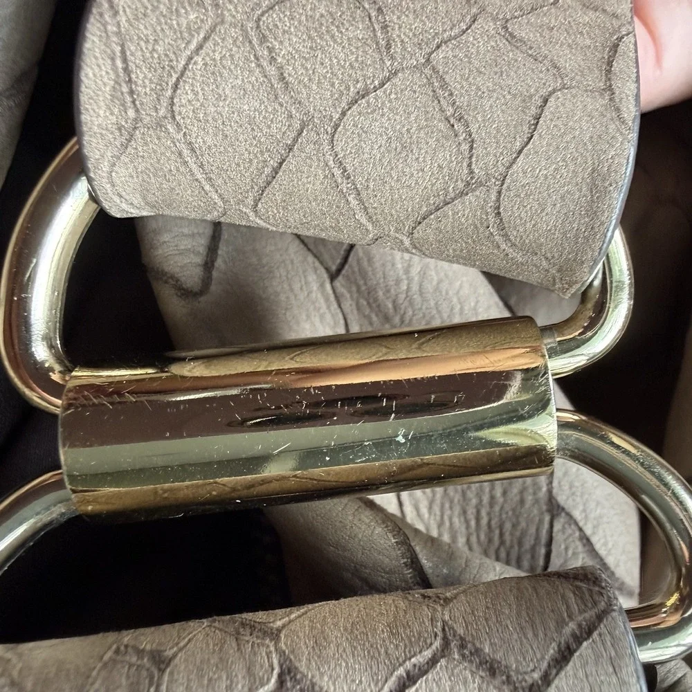 Coccinelle exterior python embossed